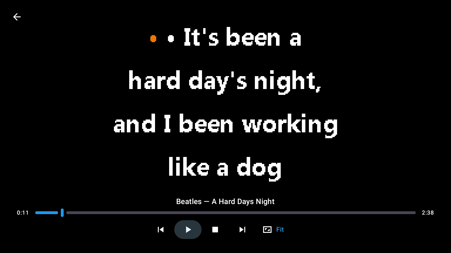 CD+G lyrics rendered on screen during playback of A Hard Day's Night